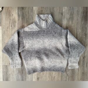 Fuzzy sweater with funnel neck and ombre stripe